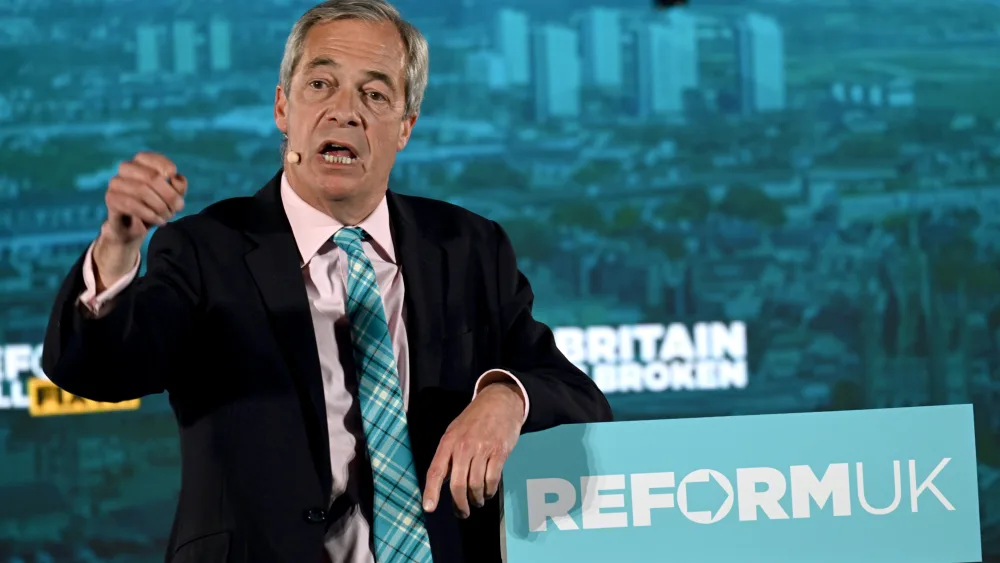 SNP leader John Swinney insists a vote for his party next week will help ‘stop Nigel Farage at theborder’. (Michal Wachucik/PA)