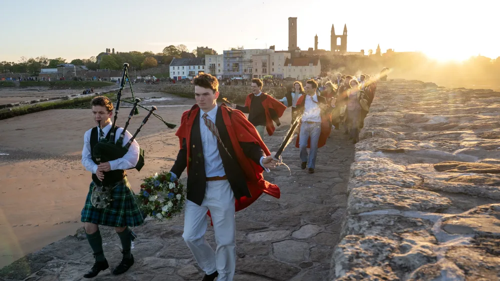 Red-robed students walked through the town for the Gaudie