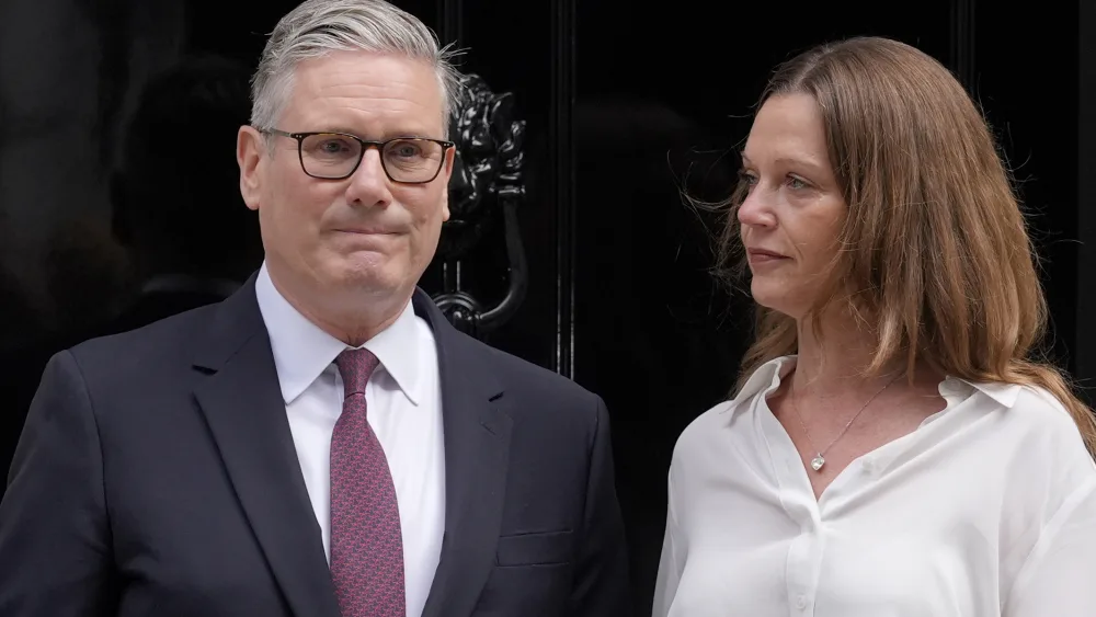 Prime Minister Sir Keir Starmer and his wife Lady Victoria Starmer on the steps of 10 Downing Street, London