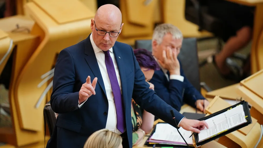 John Swinney speaks during First Minister's Questions