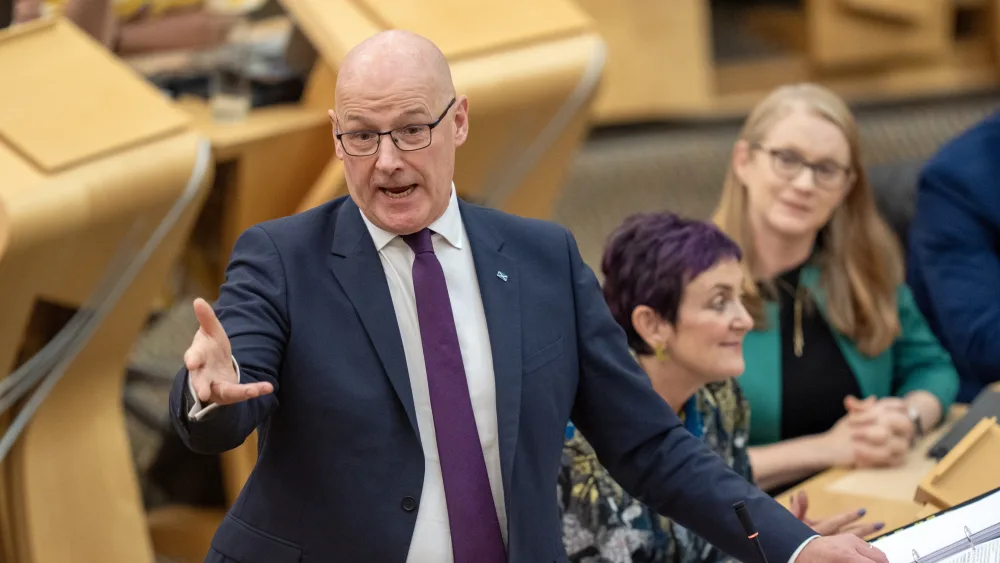 John Swinney making a point in Holyrood