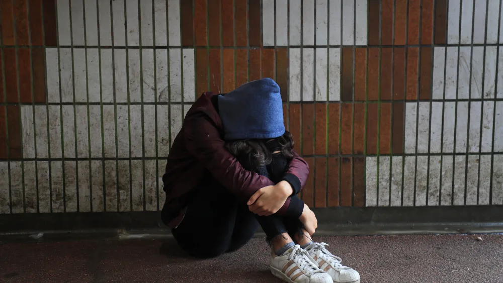 A picture posed by a model of a child in distress