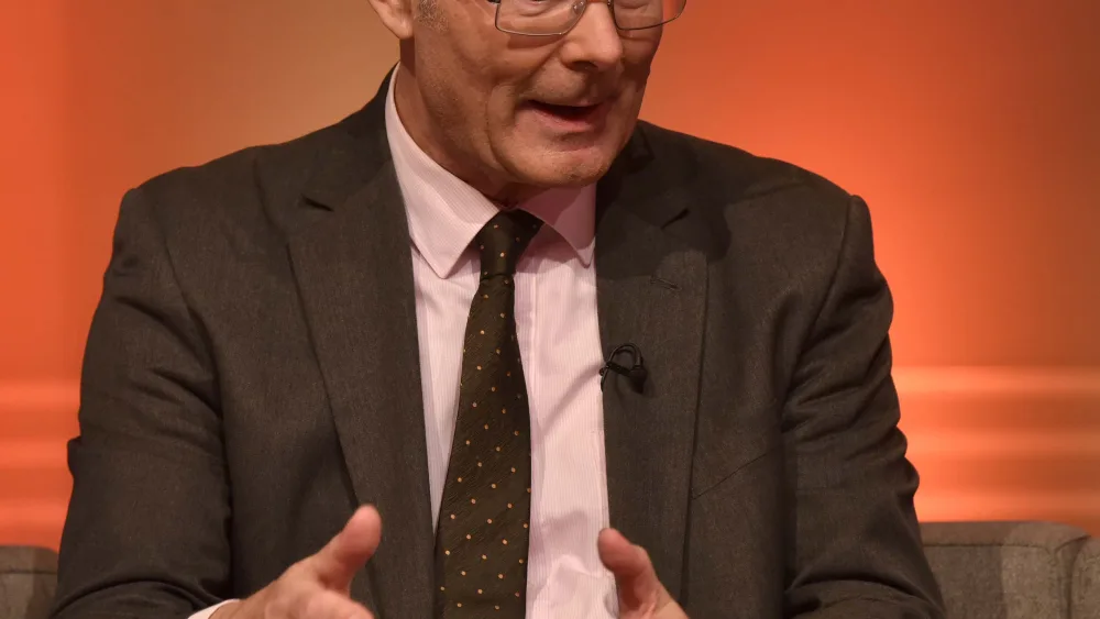 Sir John Curtice speaking in a TV studio