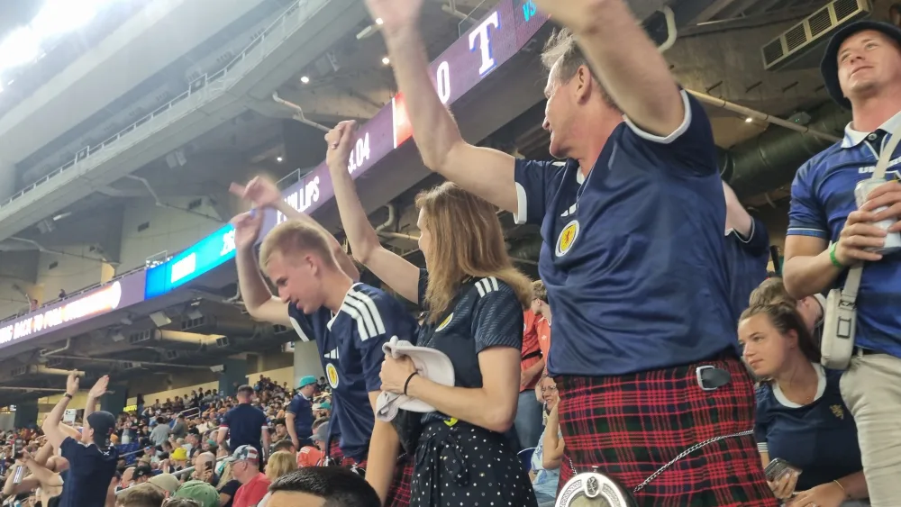 The Scots cheers for the Marlins throughout their game against the Texas Rangers. (Ryan McDougall/PA)