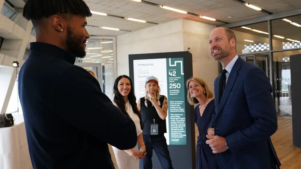 The Prince of Wales speaks to participants at the Homewards initiative event
