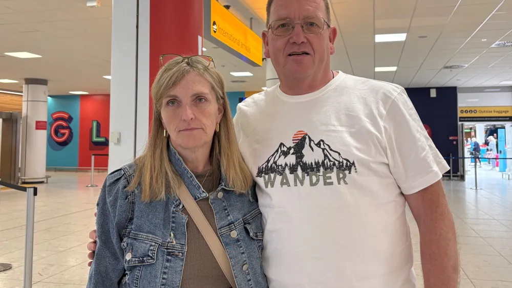 Passengers Barbara Ann Stoddart and Andrew Lithgow, who were due to fly to London Heathrow and on to Las Vegas to be married - before their flight to London was cancelled, speaking at Glasgow Airport