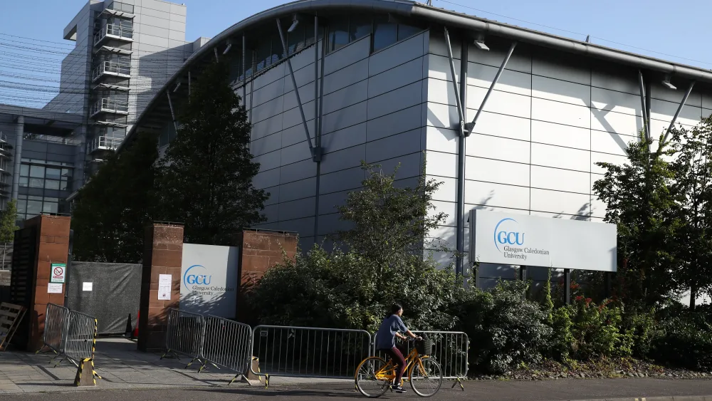 Staff at Glasgow Caledonian University are to strike on graduation days as part of a dispute over jobs. (Andrew Milligan/PA)
