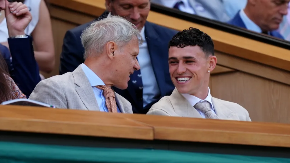 Dutch football legend Marco van Basten and Phil Foden 