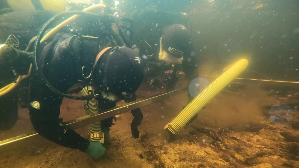 Excavating underwater at Loch Bhorgastail