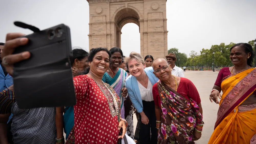 Foreign Secretary Yvette Cooper meets visitors to India Gate, a memorial built in remembrance of the soldiers lost in the First World War and Third Anglo-Afghan War, in New Delhi during her two-day trip to India 